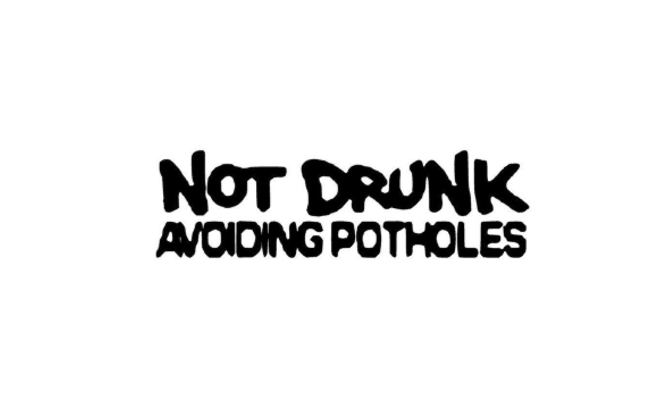Not drunk avoiding potholes